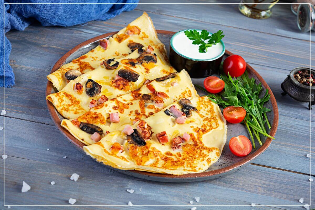 Rezept Eierpfannkuchen herzhaft – mit Schinken und Champignons